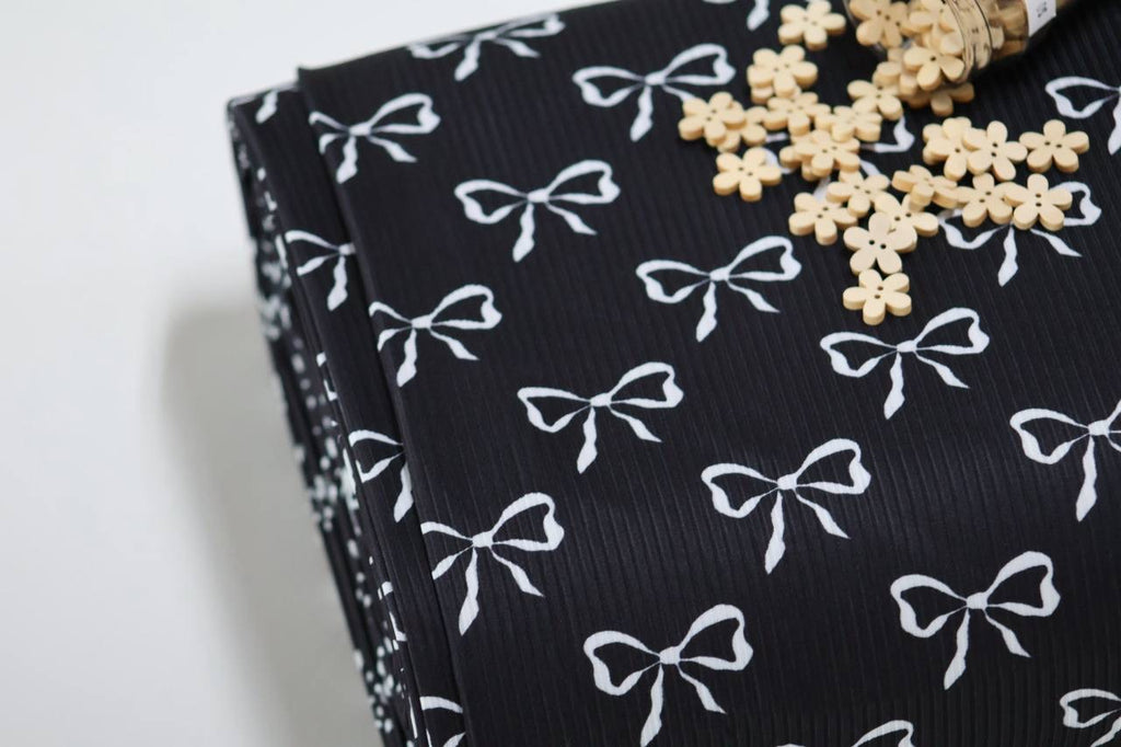 Exclusive Black Whimsical Bows by the Half Yard