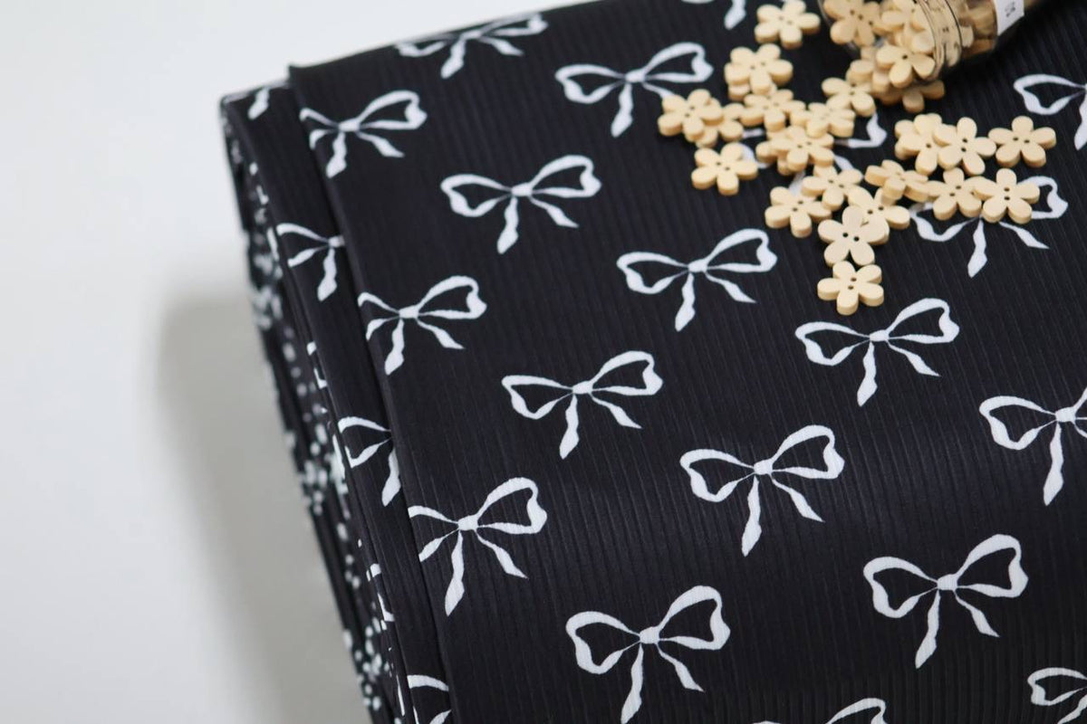 Exclusive Black Whimsical Bows by the Half Yard