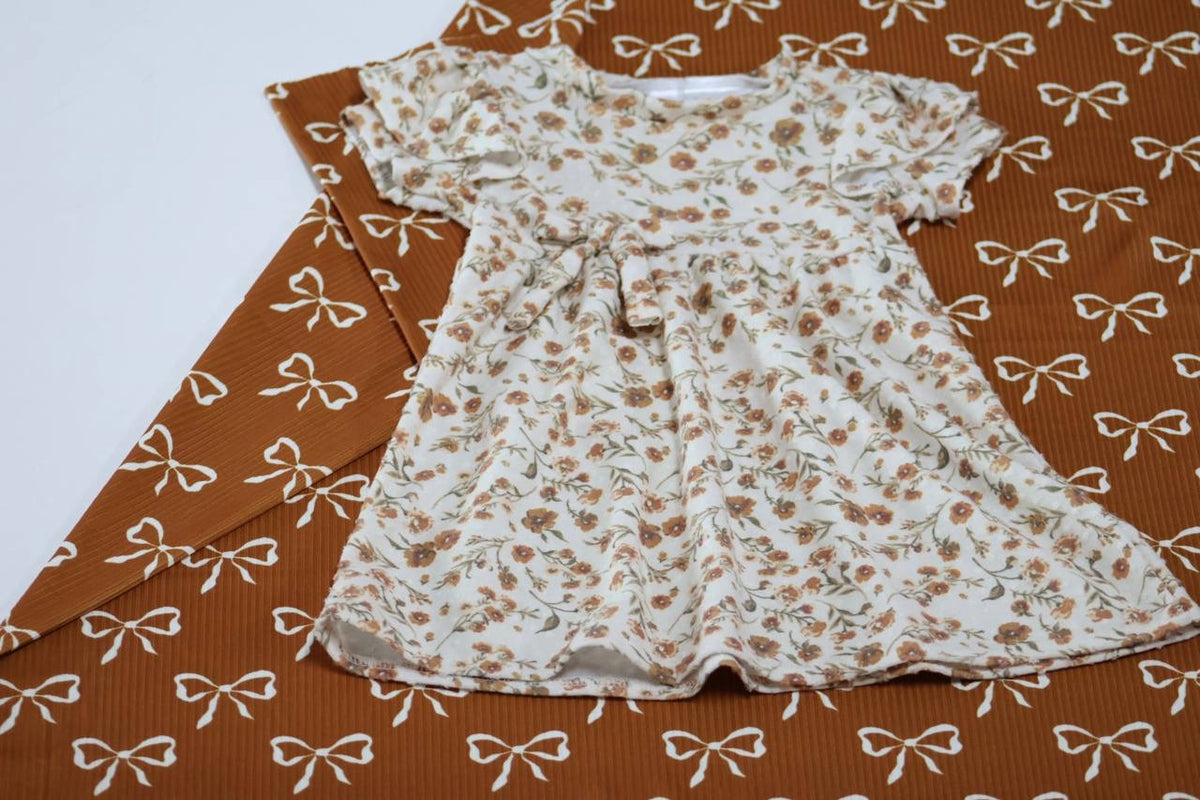 Exclusive Narrow Rib Caramel Whimsical Bows by the Half Yard