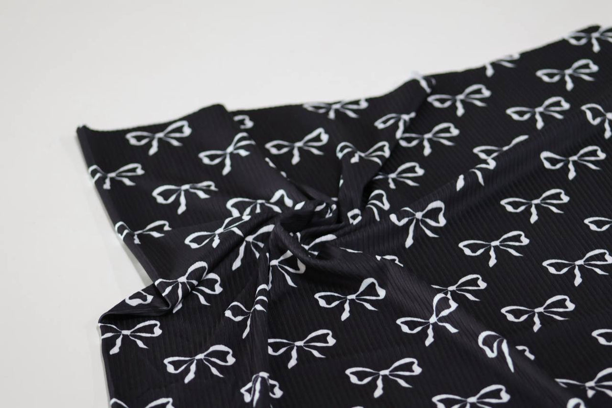 Exclusive Black Whimsical Bows by the Half Yard