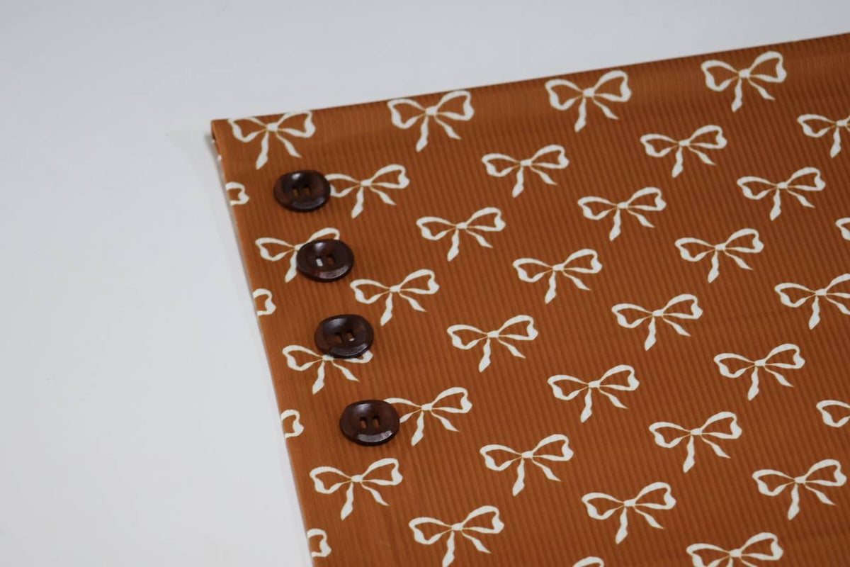 Exclusive Narrow Rib Caramel Whimsical Bows by the Half Yard