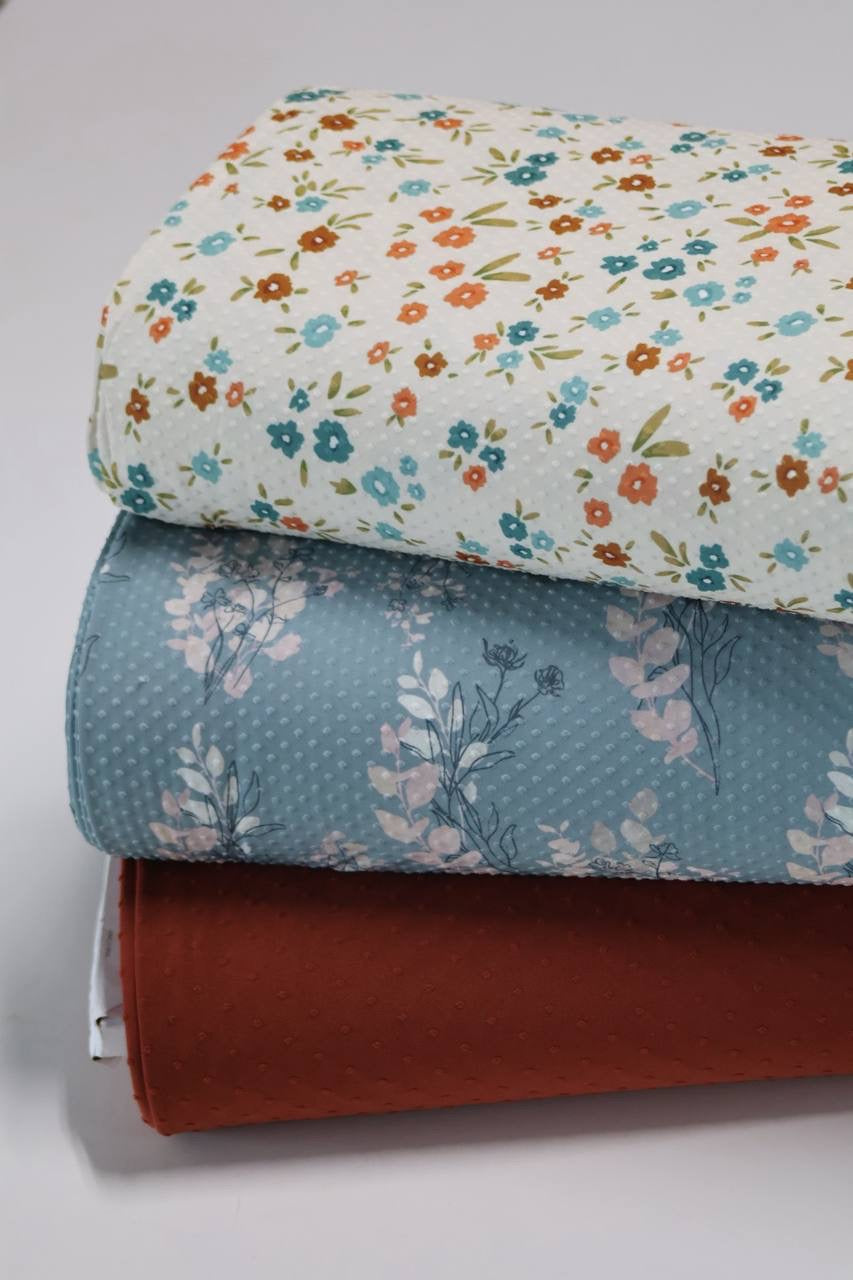 Exclusive Modern Teal & Terra-cotta Swiss Dot Knit by the Half Yard