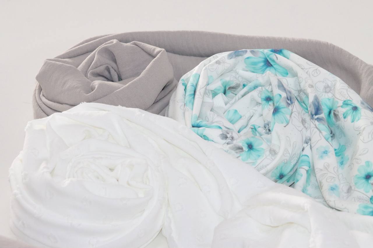 Butter knit Teal Graceful Cosmos by the half yard