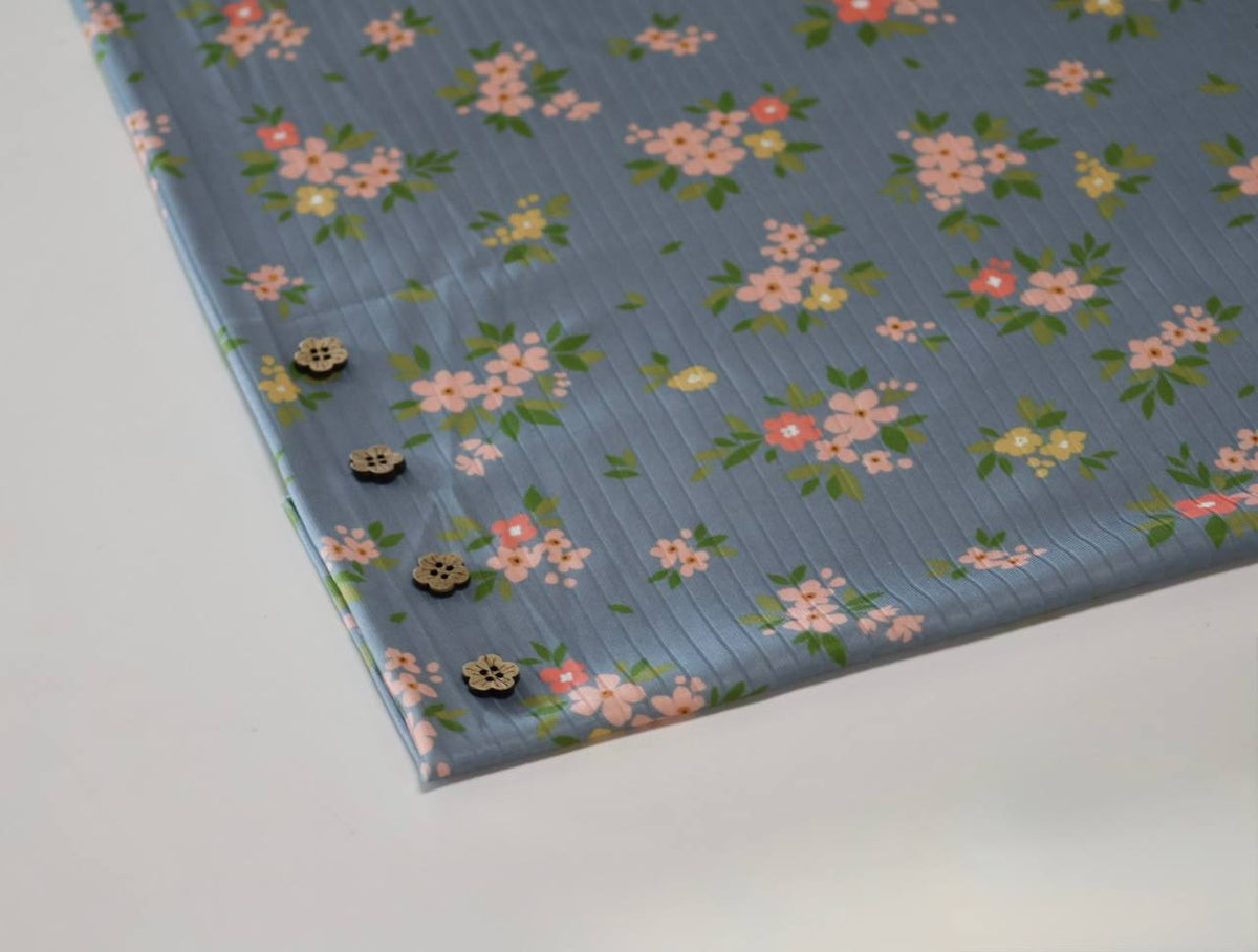Exclusive Wide rib Misty blue blossoms by the half yard