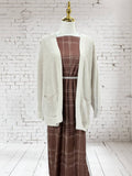Modern Mahogany Plaid
By the half yard Swiss Dot Knit