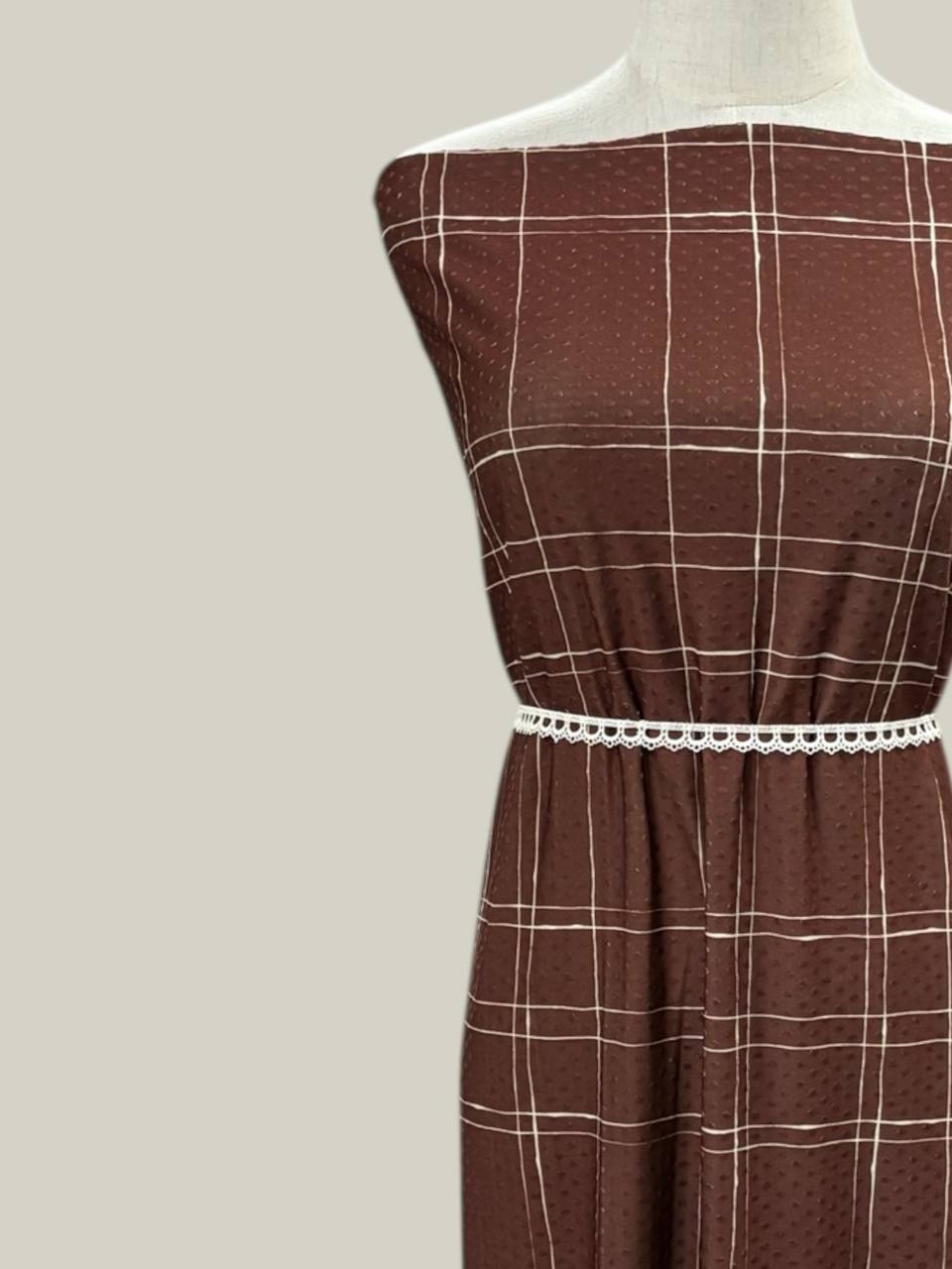 Modern Mahogany Plaid
By the half yard Swiss Dot Knit