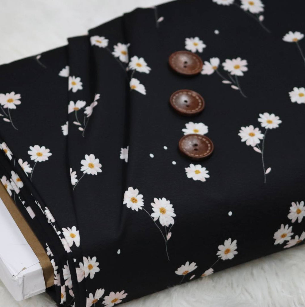 Seersucker Poly Black Dancing Daisyby the half yard