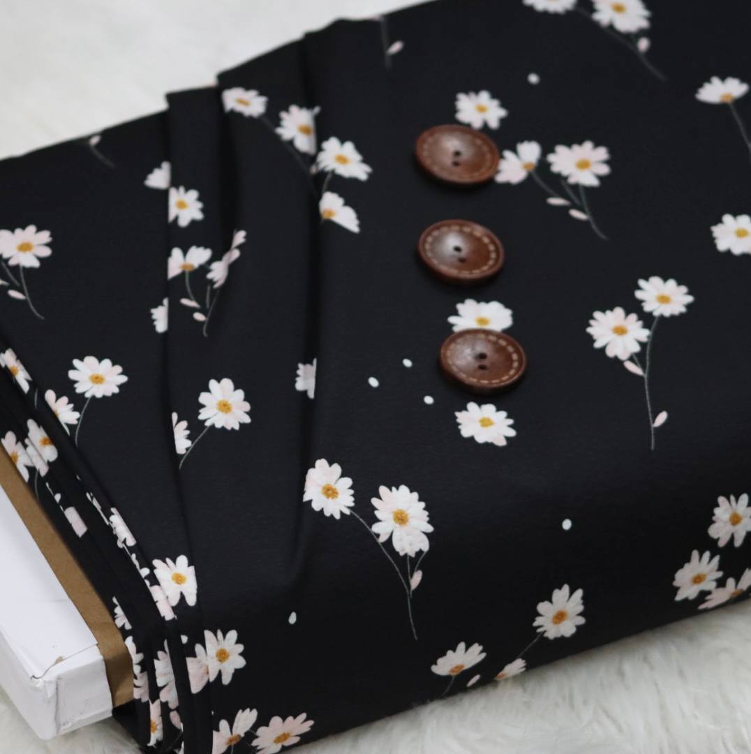 Seersucker Poly Black Dancing Daisyby the half yard