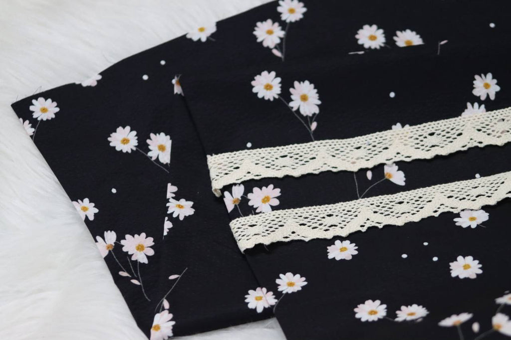 Seersucker Poly Black Dancing Daisyby the half yard