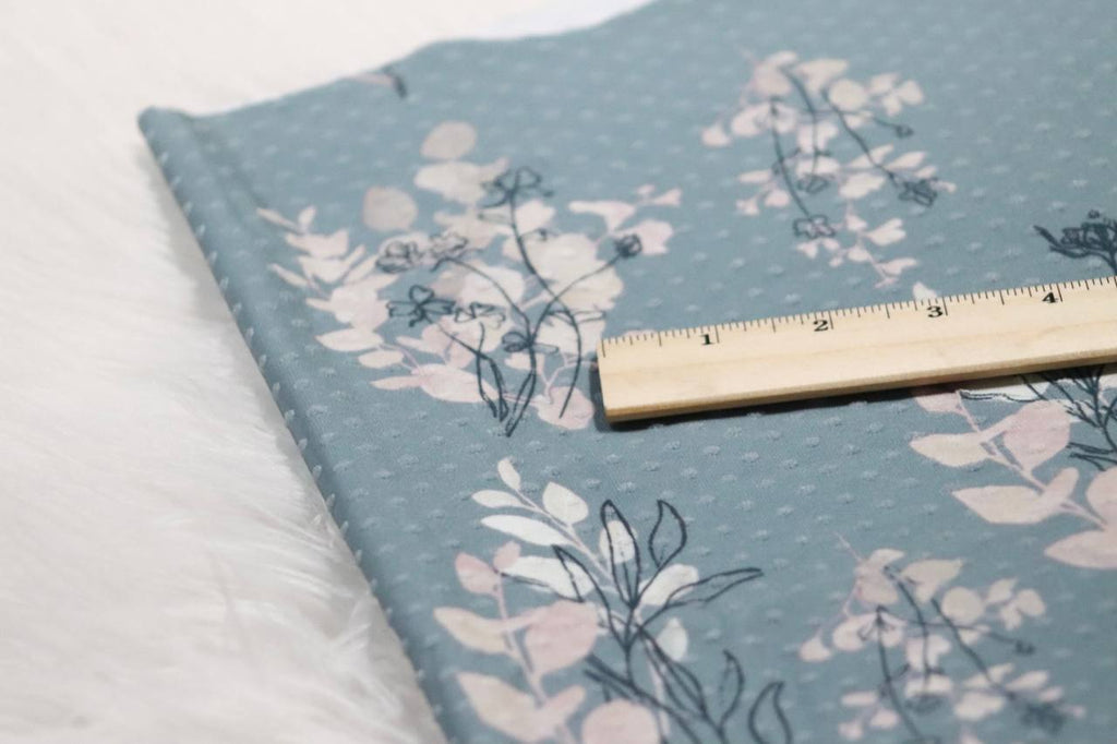 Swiss dot knit Cyan Sweet pea sprigs by the half yard