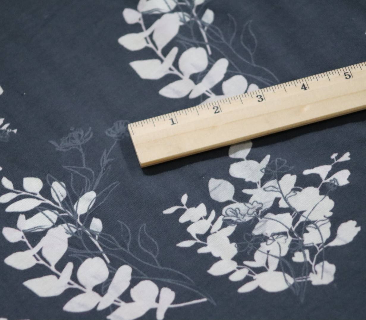 Cotton spandex Charcoal Sweet pea sprigs  by the half yard
